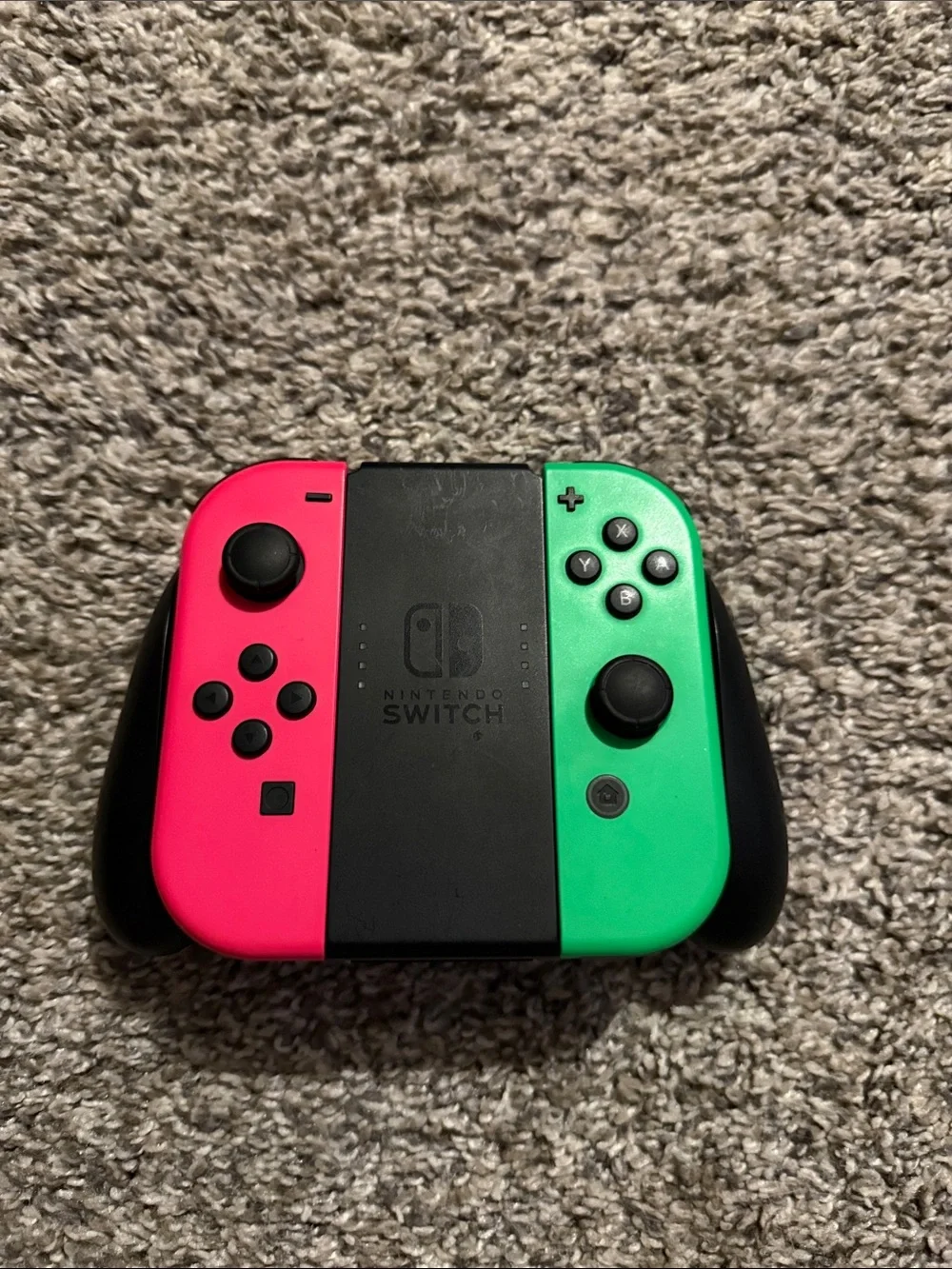 Nintendo Switch with Pink Left and Green Right Joy‑Con